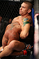 MINNEAPOLIS, MN - OCTOBER 05:  (R-L) Carlo Prater attempts a guillotine choke against Marcus LeVesseur during their lightweight fight at the UFC on FX event at Target Center on October 5, 2012 in Minneapolis, Minnesota.  (Photo by Josh Hedges/Zuffa LLC/Zuffa LLC via Getty Images)
