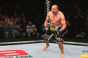 MINNEAPOLIS, MN - OCTOBER 05:  Mike Pierce reacts after knocking out Aaron Simpson during their welterweight fight at the UFC on FX event at Target Center on October 5, 2012 in Minneapolis, Minnesota.  (Photo by Josh Hedges/Zuffa LLC/Zuffa LLC via Getty Images)