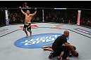 MINNEAPOLIS, MN - OCTOBER 05:  Mike Pierce (L) reacts after knocking out Aaron Simpson during their welterweight fight at the UFC on FX event at Target Center on October 5, 2012 in Minneapolis, Minnesota.  (Photo by Josh Hedges/Zuffa LLC/Zuffa LLC via Getty Images)