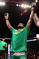 MINNEAPOLIS, MN - OCTOBER 05:  Michael Johnson reacts after knocking out Danny Castillo during their lightweight fight at the UFC on FX event at Target Center on October 5, 2012 in Minneapolis, Minnesota.  (Photo by Josh Hedges/Zuffa LLC/Zuffa LLC via Getty Images)