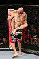 MINNEAPOLIS, MN - OCTOBER 05:  (R-L) Justin Edwards secures a guillotine choke submission to defeat Josh Neer during their welterweight fight at the UFC on FX event at Target Center on October 5, 2012 in Minneapolis, Minnesota.  (Photo by Josh Hedges/Zuffa LLC/Zuffa LLC via Getty Images)