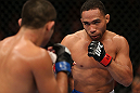 MINNEAPOLIS, MN - OCTOBER 05:  (R-L) John Dodson squares off with Jussier Formiga during their flyweight fight at the UFC on FX event at Target Center on October 5, 2012 in Minneapolis, Minnesota.  (Photo by Josh Hedges/Zuffa LLC/Zuffa LLC via Getty Images)