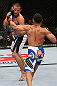 MINNEAPOLIS, MN - OCTOBER 05:  (R-L) John Dodson punches Jussier Formiga during their flyweight fight at the UFC on FX event at Target Center on October 5, 2012 in Minneapolis, Minnesota.  (Photo by Josh Hedges/Zuffa LLC/Zuffa LLC via Getty Images)