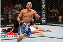 MINNEAPOLIS, MN - OCTOBER 05:  John Dodson reacts after knocking out Jussier Formiga during their flyweight fight at the UFC on FX event at Target Center on October 5, 2012 in Minneapolis, Minnesota.  (Photo by Josh Hedges/Zuffa LLC/Zuffa LLC via Getty Images)