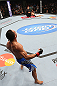 MINNEAPOLIS, MN - OCTOBER 05:  John Dodson (L) reacts after knocking out Jussier Formiga during their flyweight fight at the UFC on FX event at Target Center on October 5, 2012 in Minneapolis, Minnesota.  (Photo by Josh Hedges/Zuffa LLC/Zuffa LLC via Getty Images)