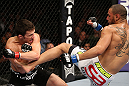 MINNEAPOLIS, MN - OCTOBER 05:  (R-L) Jay Hieron kicks Jake Ellenberger during their welterweight fight at the UFC on FX event at Target Center on October 5, 2012 in Minneapolis, Minnesota.  (Photo by Josh Hedges/Zuffa LLC/Zuffa LLC via Getty Images)