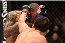 MINNEAPOLIS, MN - OCTOBER 05:  (R-L) Jake Ellenberger punches Jay Hieron during their welterweight fight at the UFC on FX event at Target Center on October 5, 2012 in Minneapolis, Minnesota.  (Photo by Josh Hedges/Zuffa LLC/Zuffa LLC via Getty Images)