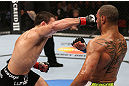 MINNEAPOLIS, MN - OCTOBER 05:  (L-R) Jake Ellenberger punches Jay Hieron during their welterweight fight at the UFC on FX event at Target Center on October 5, 2012 in Minneapolis, Minnesota.  (Photo by Josh Hedges/Zuffa LLC/Zuffa LLC via Getty Images)