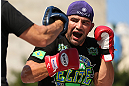 RIO DE JANEIRO, BRAZIL - OCTOBER 10:  Glover Teixeira works out for fans and media during an open training session ahead of UFC 153 at Arcos da Lapa: Praca Cardeal Camara on October 10, 2012 in Rio de Janeiro, Brazil.  (Photo by Josh Hedges/Zuffa LLC/Zuffa LLC via Getty Images)