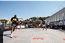 RIO DE JANEIRO, BRAZIL - OCTOBER 10:  Anderson Silva works out for fans and media during an open training session ahead of UFC 153 at Arcos da Lapa: Praca Cardeal Camara on October 10, 2012 in Rio de Janeiro, Brazil.  (Photo by Josh Hedges/Zuffa LLC/Zuffa LLC via Getty Images)