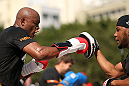 RIO DE JANEIRO, BRAZIL - OCTOBER 10:  Anderson Silva works out for fans and media during an open training session ahead of UFC 153 at Arcos da Lapa: Praca Cardeal Camara on October 10, 2012 in Rio de Janeiro, Brazil.  (Photo by Josh Hedges/Zuffa LLC/Zuffa LLC via Getty Images)
