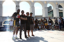 RIO DE JANEIRO, BRAZIL - OCTOBER 10:  Anderson Silva (L) poses for a photo with members of rock band Linkin Park during an open training session ahead of UFC 153 at Arcos da Lapa: Praca Cardeal Camara on October 10, 2012 in Rio de Janeiro, Brazil.  (Photo by Josh Hedges/Zuffa LLC/Zuffa LLC via Getty Images)