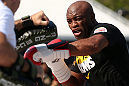 RIO DE JANEIRO, BRAZIL - OCTOBER 10:  Anderson Silva works out for fans and media during an open training session ahead of UFC 153 at Arcos da Lapa: Praca Cardeal Camara on October 10, 2012 in Rio de Janeiro, Brazil.  (Photo by Josh Hedges/Zuffa LLC/Zuffa LLC via Getty Images)