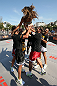 RIO DE JANEIRO, BRAZIL - OCTOBER 10:  Anderson Silva and his team greet a fan after an open training session ahead of UFC 153 at Arcos da Lapa: Praca Cardeal Camara on October 10, 2012 in Rio de Janeiro, Brazil.  (Photo by Josh Hedges/Zuffa LLC/Zuffa LLC via Getty Images)