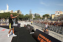 RIO DE JANEIRO, BRAZIL - OCTOBER 10:  Anderson Silva greets fans after an open training session ahead of UFC 153 at Arcos da Lapa: Praca Cardeal Camara on October 10, 2012 in Rio de Janeiro, Brazil.  (Photo by Josh Hedges/Zuffa LLC/Zuffa LLC via Getty Images)