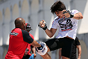 RIO DE JANEIRO, BRAZIL - OCTOBER 10:  Erick Silva works out for fans and media during an open training session ahead of UFC 153 at Arcos da Lapa: Praca Cardeal Camara on October 10, 2012 in Rio de Janeiro, Brazil.  (Photo by Josh Hedges/Zuffa LLC/Zuffa LLC via Getty Images)