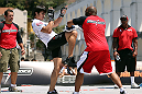 RIO DE JANEIRO, BRAZIL - OCTOBER 10:  Erick Silva works out for fans and media during an open training session ahead of UFC 153 at Arcos da Lapa: Praca Cardeal Camara on October 10, 2012 in Rio de Janeiro, Brazil.  (Photo by Josh Hedges/Zuffa LLC/Zuffa LLC via Getty Images)