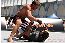 RIO DE JANEIRO, BRAZIL - OCTOBER 10:  Stephan Bonnar works out for fans and media during an open training session ahead of UFC 153 at Arcos da Lapa: Praca Cardeal Camara on October 10, 2012 in Rio de Janeiro, Brazil.  (Photo by Josh Hedges/Zuffa LLC/Zuffa LLC via Getty Images)