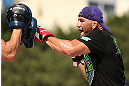 RIO DE JANEIRO, BRAZIL - OCTOBER 10:  Glover Teixeira works out for fans and media during an open training session ahead of UFC 153 at Arcos da Lapa: Praca Cardeal Camara on October 10, 2012 in Rio de Janeiro, Brazil.  (Photo by Josh Hedges/Zuffa LLC/Zuffa LLC via Getty Images)