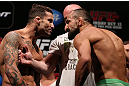 RIO DE JANEIRO, BRAZIL - OCTOBER 12:  (L-R) Opponents Cristiano Marcello and Reza Madadi face off during the UFC 153 weigh in at HSBC Arena on October 12, 2012 in Rio de Janeiro, Brazil.  (Photo by Josh Hedges/Zuffa LLC/Zuffa LLC via Getty Images)