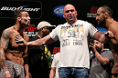 RIO DE JANEIRO, BRAZIL - OCTOBER 12:  Opponents Cristiano Marcello (L) and Reza Madadi (R) are separated by UFC President Dana White during the UFC 153 weigh in at HSBC Arena on October 12, 2012 in Rio de Janeiro, Brazil.  (Photo by Josh Hedges/Zuffa LLC/Zuffa LLC via Getty Images)