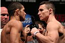 RIO DE JANEIRO, BRAZIL - OCTOBER 12:  (L-R) Opponents Diego Brandao and Joey Gambino face off during the UFC 153 weigh in at HSBC Arena on October 12, 2012 in Rio de Janeiro, Brazil.  (Photo by Josh Hedges/Zuffa LLC/Zuffa LLC via Getty Images)