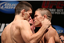RIO DE JANEIRO, BRAZIL - OCTOBER 12:  (L-R) Opponents Demian Maia and Rick Story face off during the UFC 153 weigh in at HSBC Arena on October 12, 2012 in Rio de Janeiro, Brazil.  (Photo by Josh Hedges/Zuffa LLC/Zuffa LLC via Getty Images)