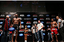 RIO DE JANEIRO, BRAZIL - OCTOBER 12:  Anderson Silva (L) weighs in as opponent Stephan Bonnar (R) looks on during the UFC 153 weigh in at HSBC Arena on October 12, 2012 in Rio de Janeiro, Brazil.  (Photo by Josh Hedges/Zuffa LLC/Zuffa LLC via Getty Images)