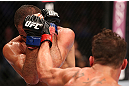 RIO DE JANEIRO, BRAZIL - OCTOBER 13:  (R-L) Cristiano Marcello punches Reza Madadi during their lightweight fight at UFC 153 inside HSBC Arena on October 13, 2012 in Rio de Janeiro, Brazil.  (Photo by Josh Hedges/Zuffa LLC/Zuffa LLC via Getty Images)