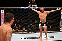 RIO DE JANEIRO, BRAZIL - OCTOBER 13:  (R-L) Reza Madadi taunts Cristiano Marcello during their lightweight fight at UFC 153 inside HSBC Arena on October 13, 2012 in Rio de Janeiro, Brazil.  (Photo by Josh Hedges/Zuffa LLC/Zuffa LLC via Getty Images)