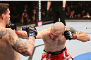RIO DE JANEIRO, BRAZIL - OCTOBER 13:  (R-L) Luiz Cane punches Chris Camozzi during their middleweight fight at UFC 153 inside HSBC Arena on October 13, 2012 in Rio de Janeiro, Brazil.  (Photo by Josh Hedges/Zuffa LLC/Zuffa LLC via Getty Images)