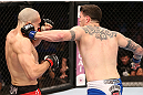 RIO DE JANEIRO, BRAZIL - OCTOBER 13:  (R-L) Chris Camozzi punches Luiz Cane during their middleweight fight at UFC 153 inside HSBC Arena on October 13, 2012 in Rio de Janeiro, Brazil.  (Photo by Josh Hedges/Zuffa LLC/Zuffa LLC via Getty Images)