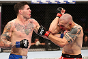 RIO DE JANEIRO, BRAZIL - OCTOBER 13:  (L-R) Chris Camozzi punches Luiz Cane during their middleweight fight at UFC 153 inside HSBC Arena on October 13, 2012 in Rio de Janeiro, Brazil.  (Photo by Josh Hedges/Zuffa LLC/Zuffa LLC via Getty Images)
