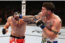 RIO DE JANEIRO, BRAZIL - OCTOBER 13:  (R-L) Chris Camozzi punches Luiz Cane during their middleweight fight at UFC 153 inside HSBC Arena on October 13, 2012 in Rio de Janeiro, Brazil.  (Photo by Josh Hedges/Zuffa LLC/Zuffa LLC via Getty Images)