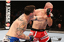 RIO DE JANEIRO, BRAZIL - OCTOBER 13:  (L-R) Chris Camozzi punches Luiz Cane during their middleweight fight at UFC 153 inside HSBC Arena on October 13, 2012 in Rio de Janeiro, Brazil.  (Photo by Josh Hedges/Zuffa LLC/Zuffa LLC via Getty Images)