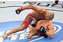 RIO DE JANEIRO, BRAZIL - OCTOBER 13:  (L-R) Diego Brandao punches Joey Gambino during their featherweight fight at UFC 153 inside HSBC Arena on October 13, 2012 in Rio de Janeiro, Brazil.  (Photo by Josh Hedges/Zuffa LLC/Zuffa LLC via Getty Images)