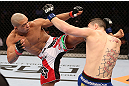 RIO DE JANEIRO, BRAZIL - OCTOBER 13:  (L-R) Diego Brandao kicks Joey Gambino during their featherweight fight at UFC 153 inside HSBC Arena on October 13, 2012 in Rio de Janeiro, Brazil.  (Photo by Josh Hedges/Zuffa LLC/Zuffa LLC via Getty Images)