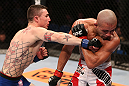 RIO DE JANEIRO, BRAZIL - OCTOBER 13:  (L-R) Joey Gambino punches Diego Brandao during their featherweight fight at UFC 153 inside HSBC Arena on October 13, 2012 in Rio de Janeiro, Brazil.  (Photo by Josh Hedges/Zuffa LLC/Zuffa LLC via Getty Images)