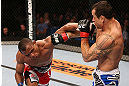 RIO DE JANEIRO, BRAZIL - OCTOBER 13:  (L-R) Francisco Trinaldo punches Gleison Tibau during their lightweight fight at UFC 153 inside HSBC Arena on October 13, 2012 in Rio de Janeiro, Brazil.  (Photo by Josh Hedges/Zuffa LLC/Zuffa LLC via Getty Images)
