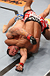 RIO DE JANEIRO, BRAZIL - OCTOBER 13:  (L-R) Gleison Tibau fights to escape a choke by Francisco Trinaldo during their lightweight fight at UFC 153 inside HSBC Arena on October 13, 2012 in Rio de Janeiro, Brazil.  (Photo by Josh Hedges/Zuffa LLC/Zuffa LLC via Getty Images)