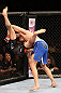 RIO DE JANEIRO, BRAZIL - OCTOBER 13:  (R-L) Demian Maia takes down Rick Story during their welterweight fight at UFC 153 inside HSBC Arena on October 13, 2012 in Rio de Janeiro, Brazil.  (Photo by Josh Hedges/Zuffa LLC/Zuffa LLC via Getty Images)