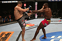 RIO DE JANEIRO, BRAZIL - OCTOBER 13:  (L-R) Wagner Prado kicks Phil Davis during their light heavyweight fight at UFC 153 inside HSBC Arena on October 13, 2012 in Rio de Janeiro, Brazil.  (Photo by Josh Hedges/Zuffa LLC/Zuffa LLC via Getty Images)