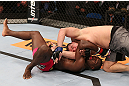 RIO DE JANEIRO, BRAZIL - OCTOBER 13:  (L-R) Phil Davis secures an anaconda choke submission against Wagner Prado during their light heavyweight fight at UFC 153 inside HSBC Arena on October 13, 2012 in Rio de Janeiro, Brazil.  (Photo by Josh Hedges/Zuffa LLC/Zuffa LLC via Getty Images)