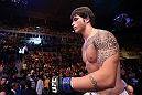 RIO DE JANEIRO, BRAZIL - OCTOBER 13:  Erick Silva enters the Octagon before his welterweight fight against Jon Fitch at UFC 153 inside HSBC Arena on October 13, 2012 in Rio de Janeiro, Brazil.  (Photo by Josh Hedges/Zuffa LLC/Zuffa LLC via Getty Images)