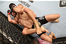 RIO DE JANEIRO, BRAZIL - OCTOBER 13:  (L-R) Erick Silva attempts to secure a rear choke submission against Jon Fitch during their welterweight fight at UFC 153 inside HSBC Arena on October 13, 2012 in Rio de Janeiro, Brazil.  (Photo by Josh Hedges/Zuffa LLC/Zuffa LLC via Getty Images)