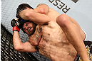 RIO DE JANEIRO, BRAZIL - OCTOBER 13:  (L-R) Erick Silva attempts to secure a rear choke submission against Jon Fitch during their welterweight fight at UFC 153 inside HSBC Arena on October 13, 2012 in Rio de Janeiro, Brazil.  (Photo by Josh Hedges/Zuffa LLC/Zuffa LLC via Getty Images)