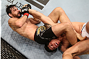 RIO DE JANEIRO, BRAZIL - OCTOBER 13:  (L-R) Jon Fitch attempts to secure an arm bar submission against Erick Silva during their welterweight fight at UFC 153 inside HSBC Arena on October 13, 2012 in Rio de Janeiro, Brazil.  (Photo by Josh Hedges/Zuffa LLC/Zuffa LLC via Getty Images)