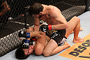 RIO DE JANEIRO, BRAZIL - OCTOBER 13:  (R-L) Jon Fitch punches Erick Silva during their welterweight fight at UFC 153 inside HSBC Arena on October 13, 2012 in Rio de Janeiro, Brazil.  (Photo by Josh Hedges/Zuffa LLC/Zuffa LLC via Getty Images)