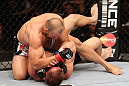 RIO DE JANEIRO, BRAZIL - OCTOBER 13:  (L-R) Glover Teixeira elbows Fabio Maldonado during their light heavyweight fight at UFC 153 inside HSBC Arena on October 13, 2012 in Rio de Janeiro, Brazil.  (Photo by Josh Hedges/Zuffa LLC/Zuffa LLC via Getty Images)