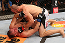 RIO DE JANEIRO, BRAZIL - OCTOBER 13:  (R-L) Glover Teixeira punches Fabio Maldonado during their light heavyweight fight at UFC 153 inside HSBC Arena on October 13, 2012 in Rio de Janeiro, Brazil.  (Photo by Josh Hedges/Zuffa LLC/Zuffa LLC via Getty Images)